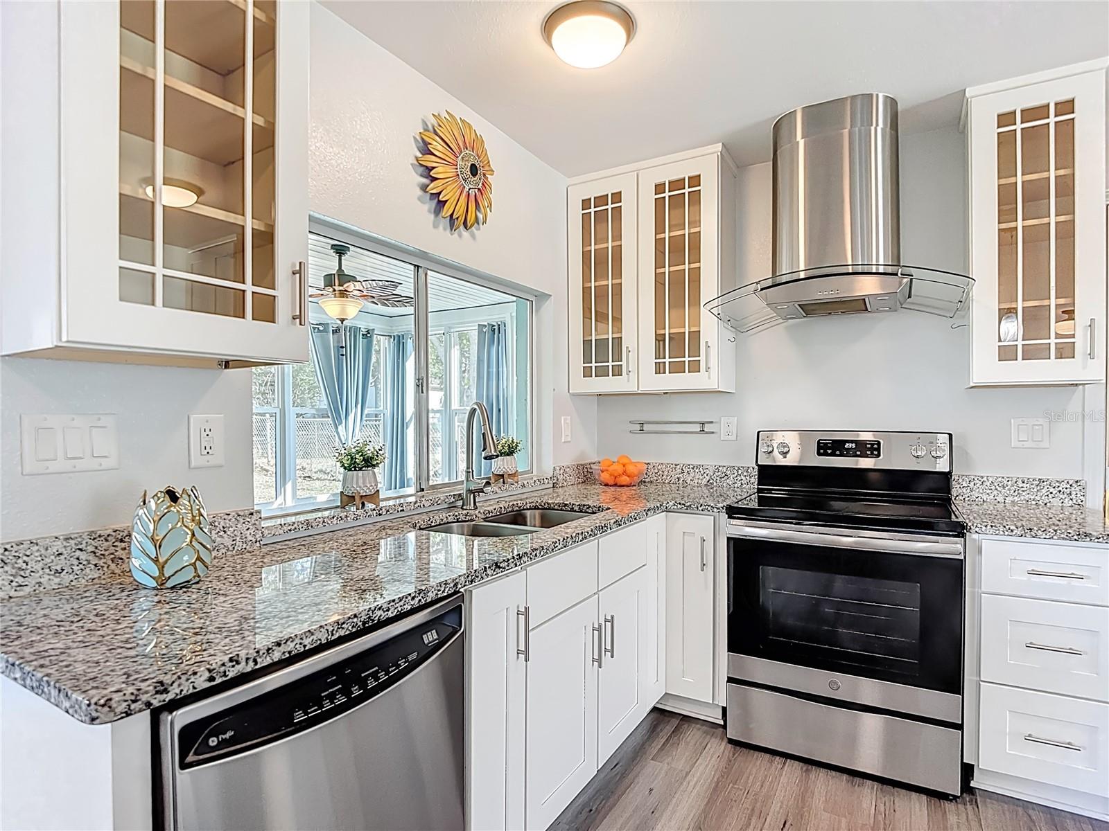 Kitchen has view into lanai