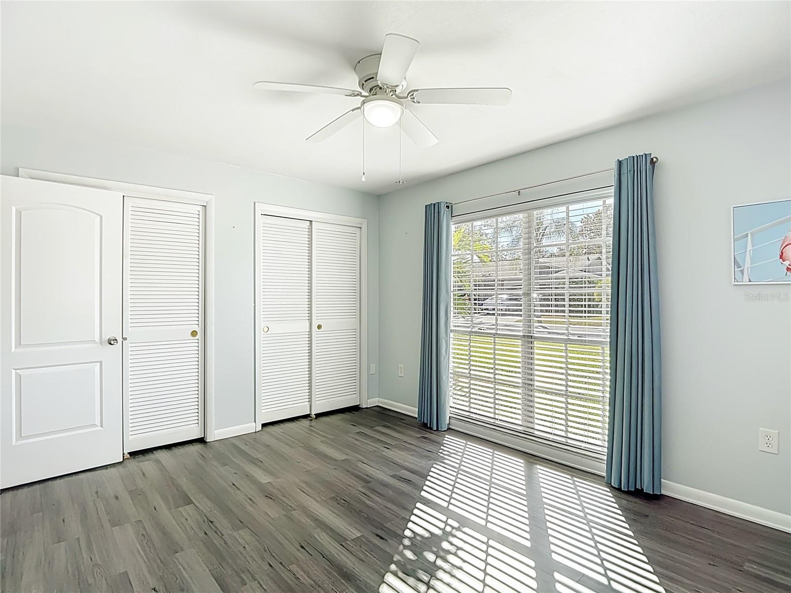 Primary bedroom w/ dual closets