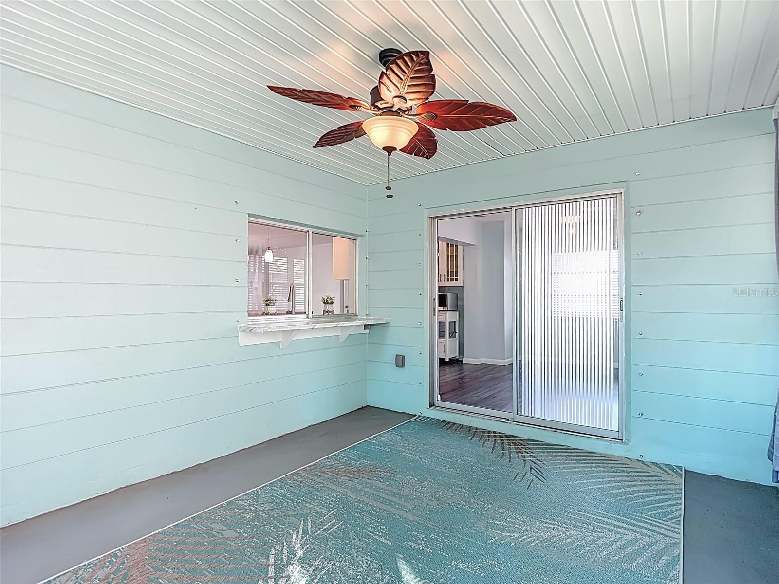 Lanai w/ pass through window into kitchen