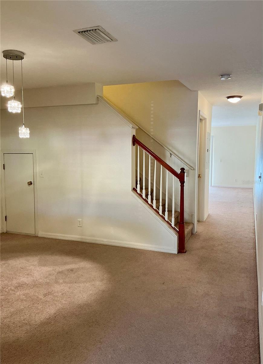 Dining Room leads to Bright Living Room and Lanai