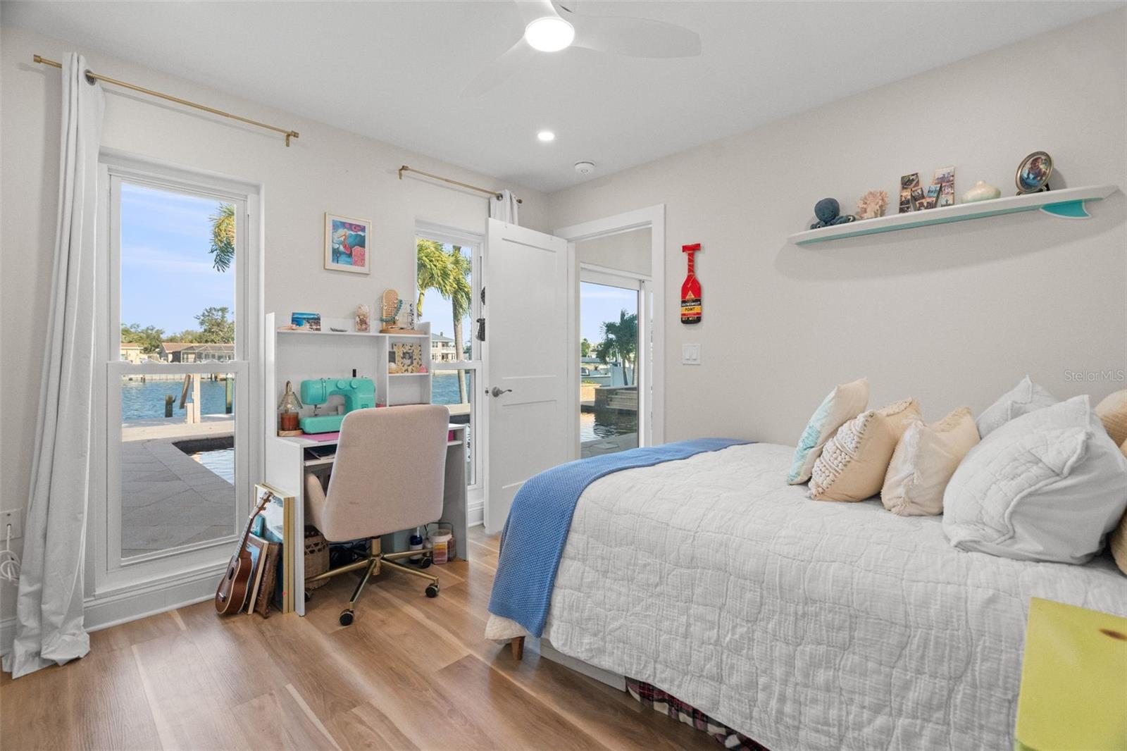 Dedicated office space or 3rd bedroom with custom built-ins and ample storage.(water views)