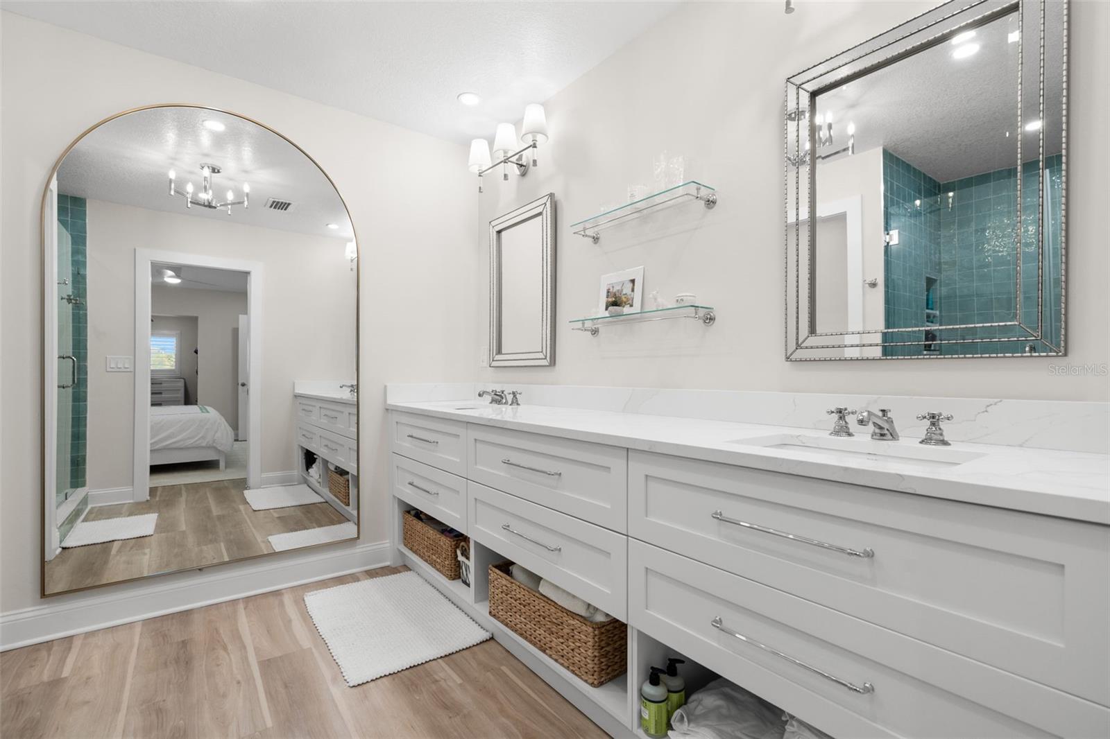 Updated bathroom with quartz vanity and modern finishes.