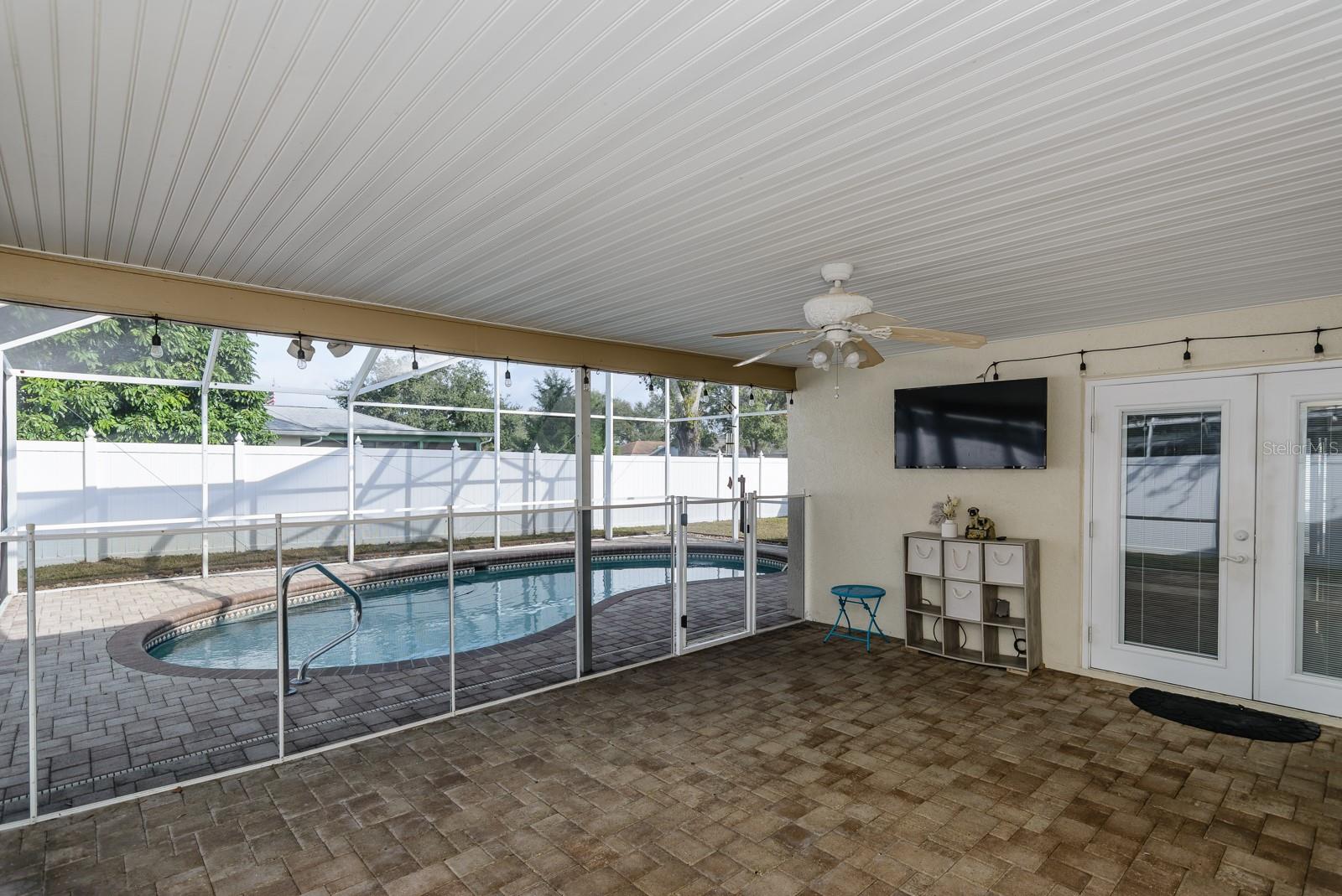 Screened in Lanai with child safety fence and pool