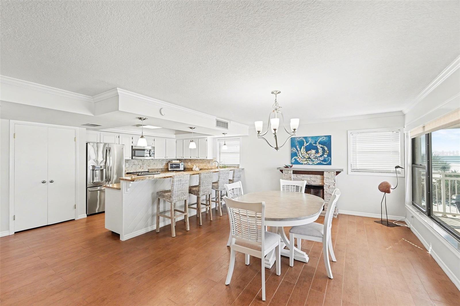 Enjoy your pantry, large kitchen and entertainment bar adjacent to an oversized dining room for intimate or large gatherings.