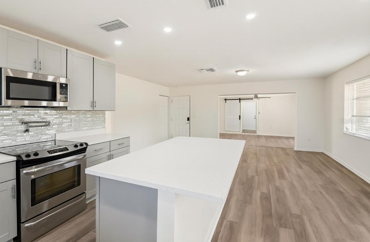 Kitchen to Dining Room to Living Room