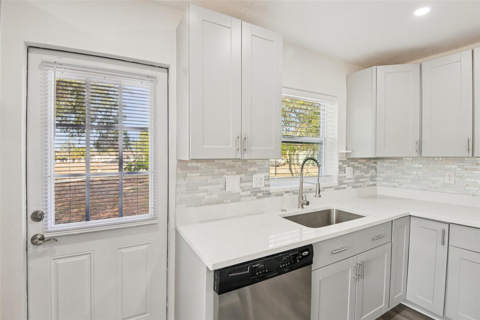 Kitchen Side Door and Sink View