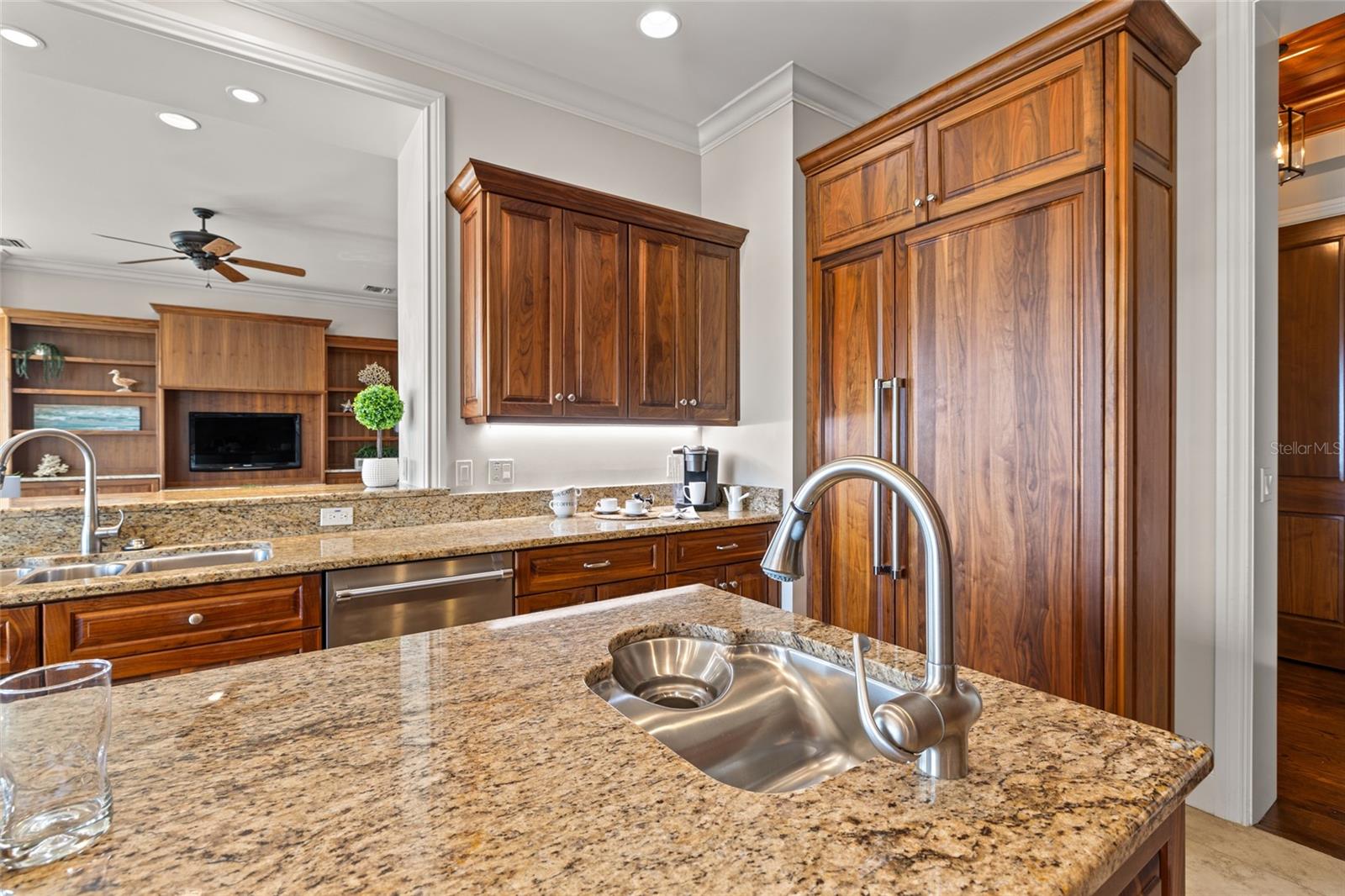 Custom wood cabinets (even on your refrigerator!), Thermador appliances, prep sink with disposal.