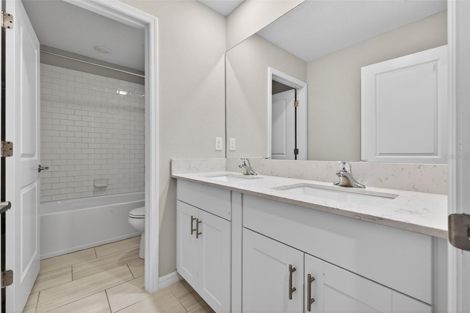 Bathroom 2 - Double Sink and Tub Shower