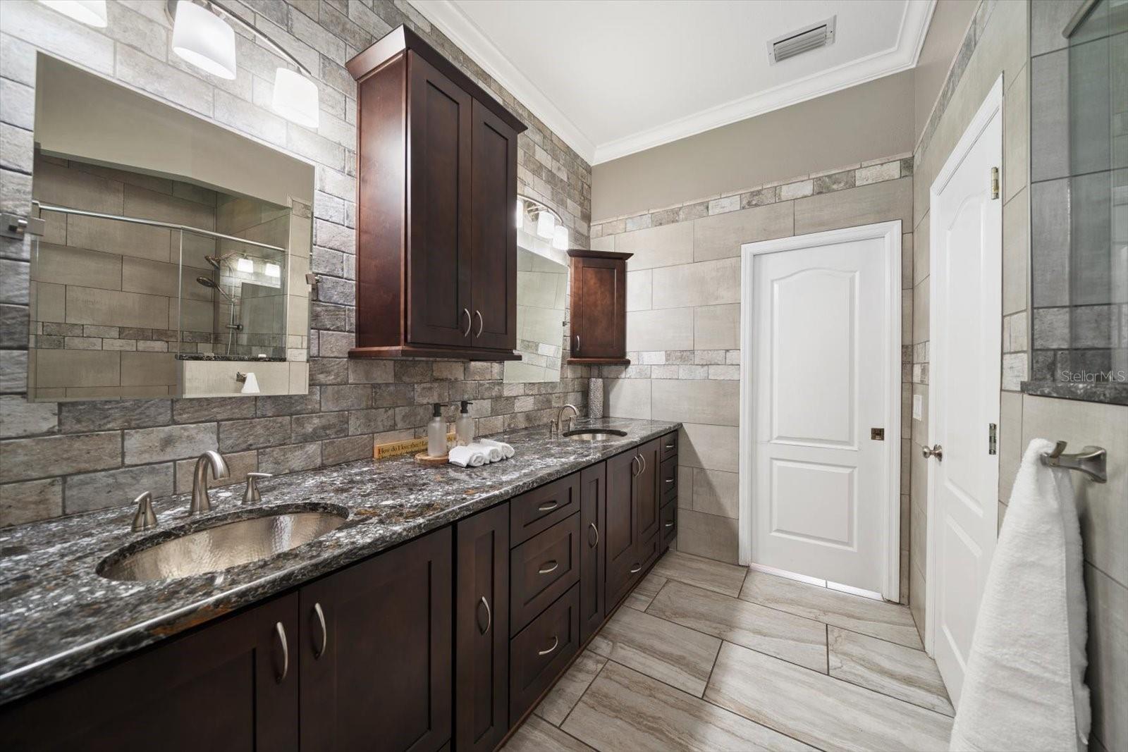 Dual vanity with separate water closet