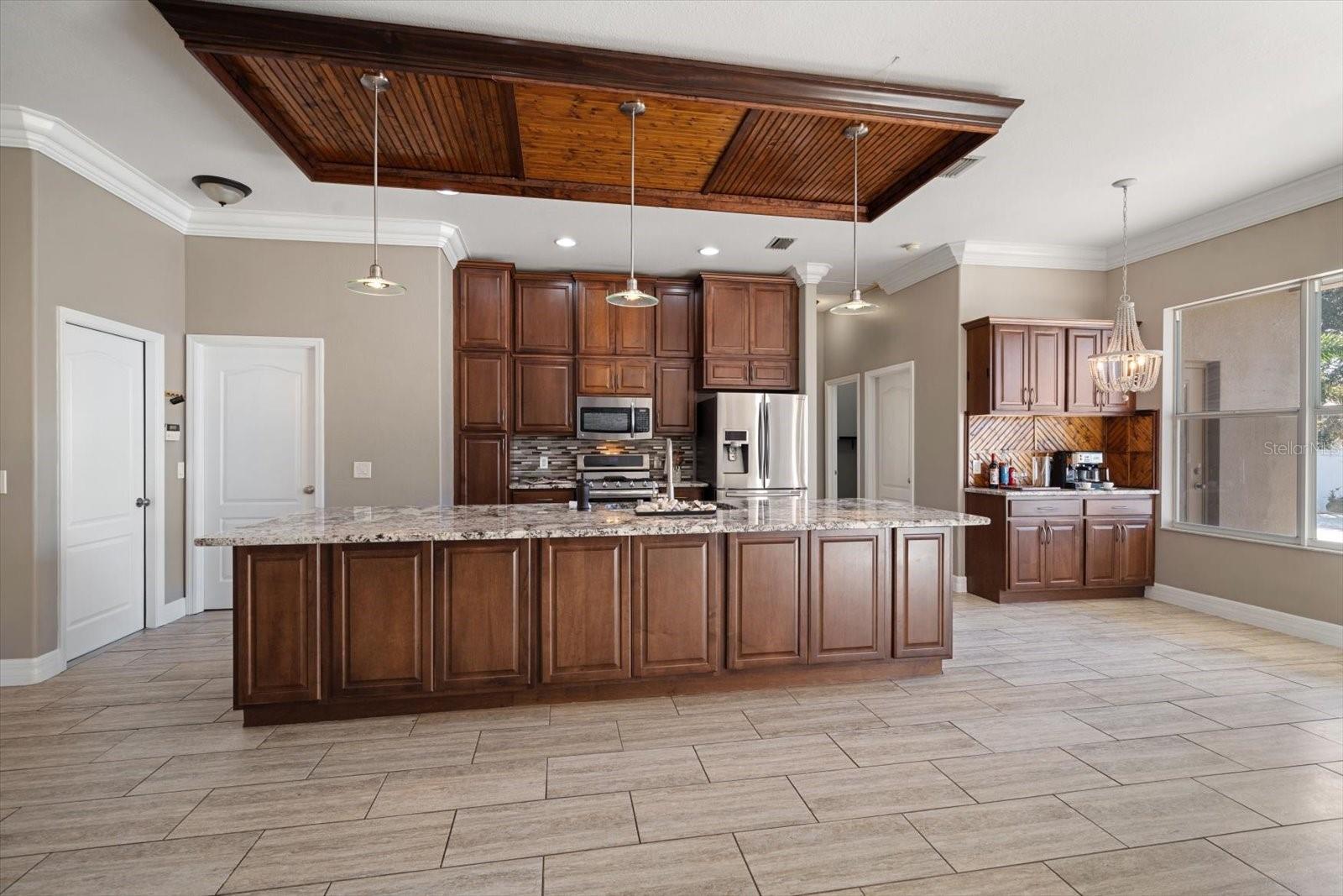 Doors from Kitchen to Garage and separate utility