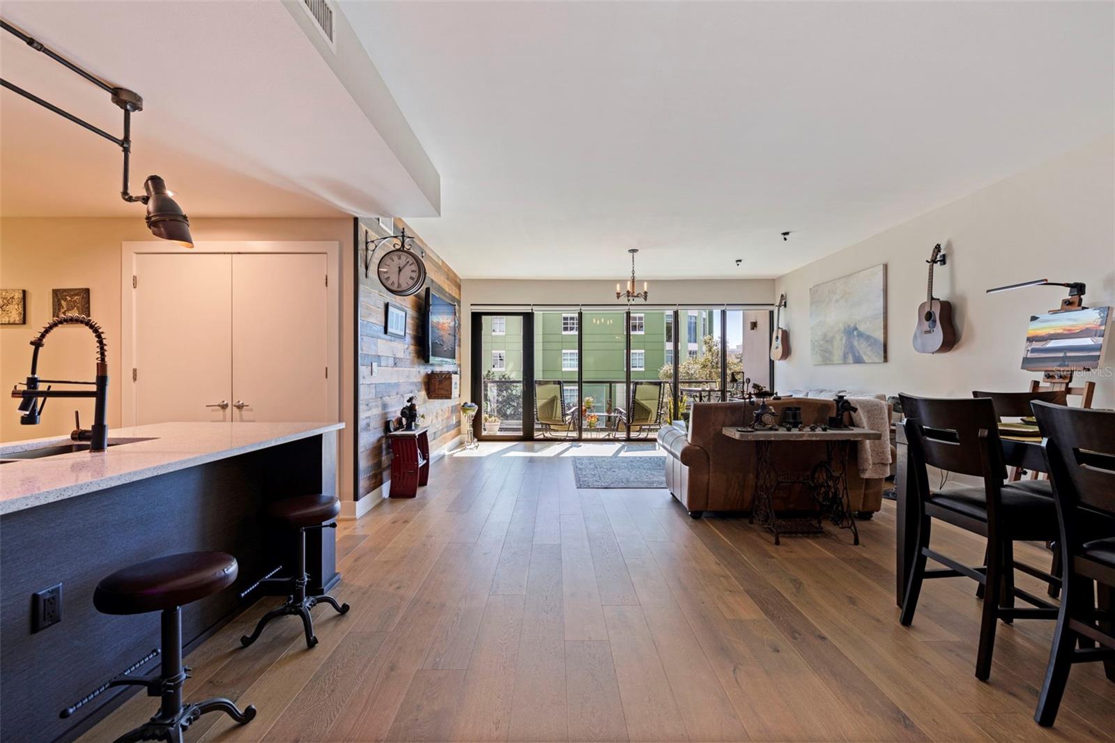 Dining room flows into Living room image 1