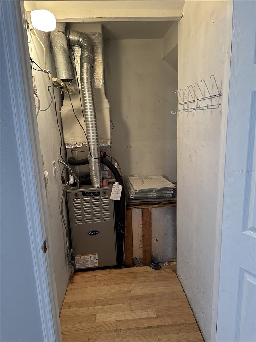 Family room closet; a/c closet