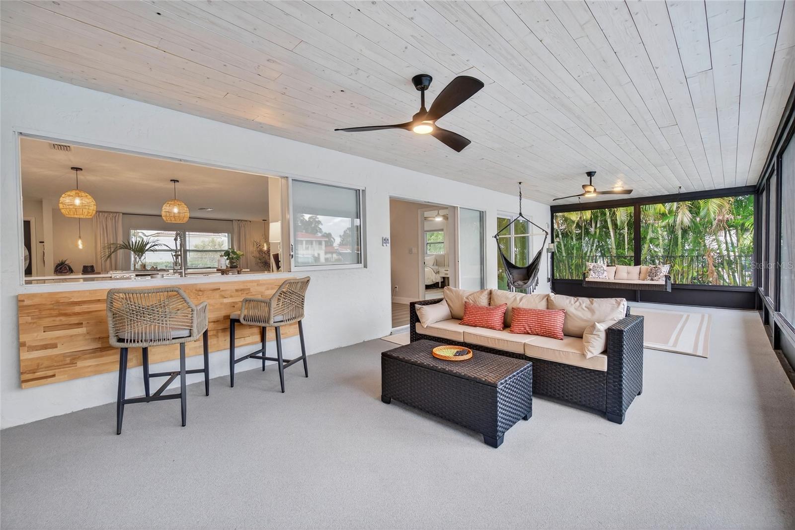 Patio Space with Collapsible Bar, Fans, and TV