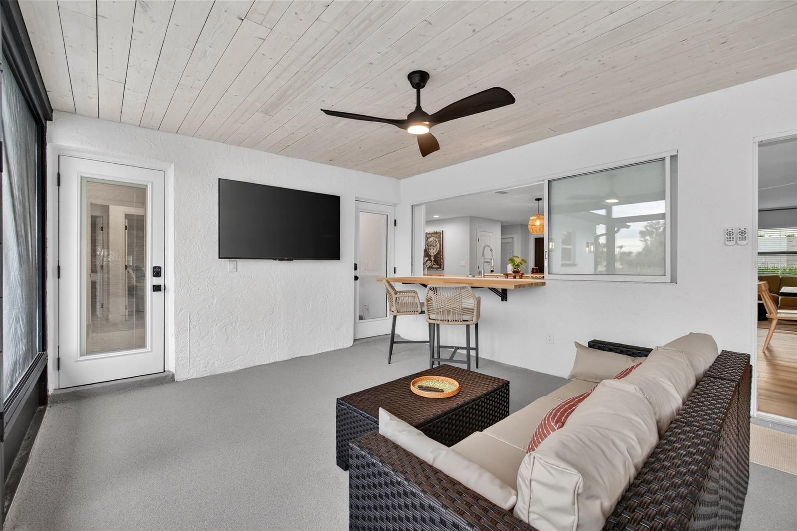 Patio Space with Collapsible Bar, Fans, and TV