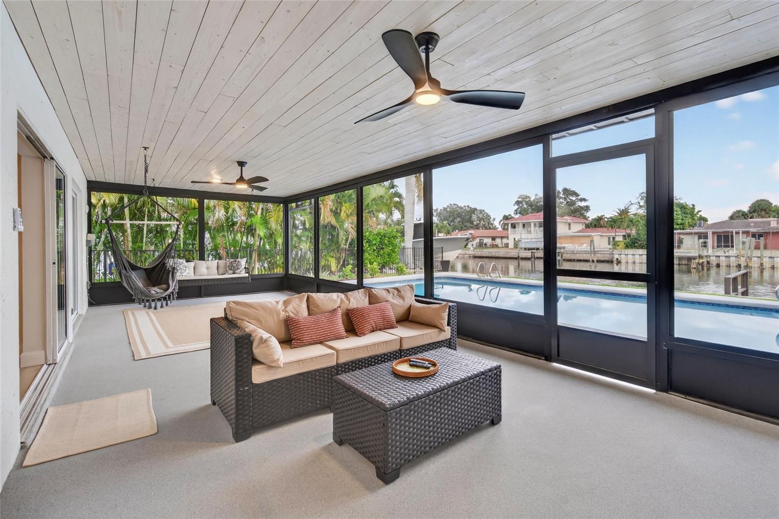 Patio Space with Collapsible Bar, Fans, and TV