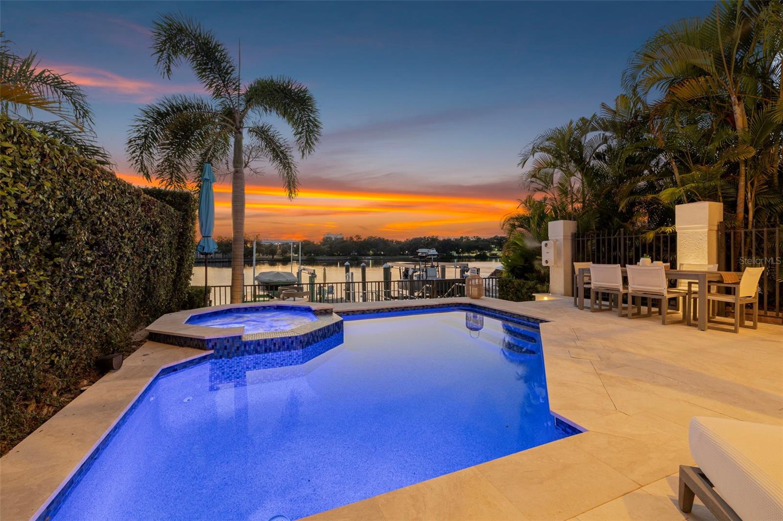 Evenings come alive with radiant skies and a serene poolside setting.
