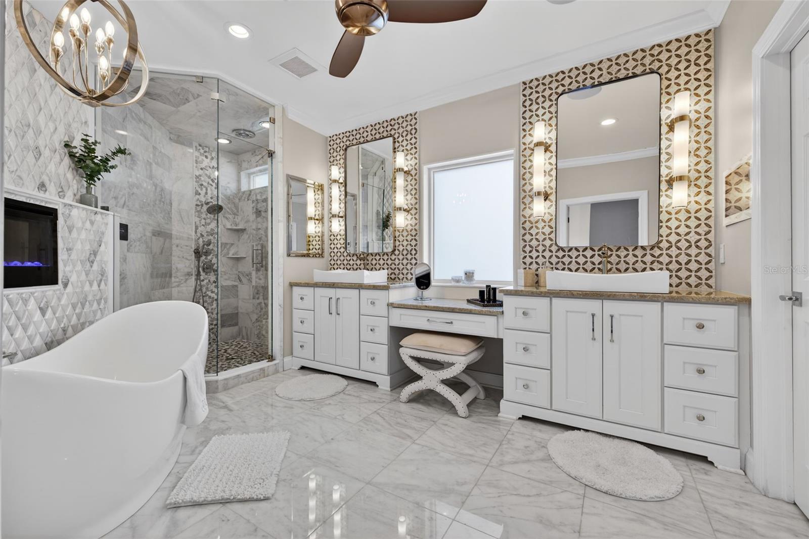 Spa-inspired primary bathroom with heated floors.