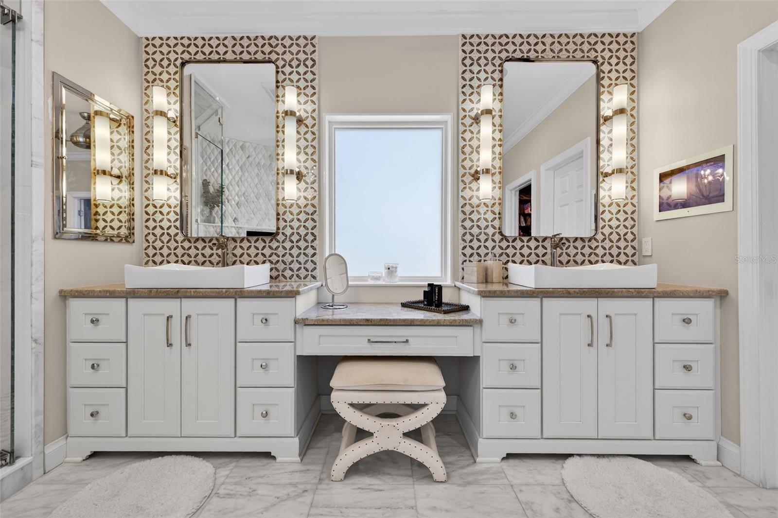 Beautifully crafted dual vanities provide both style and convenience.