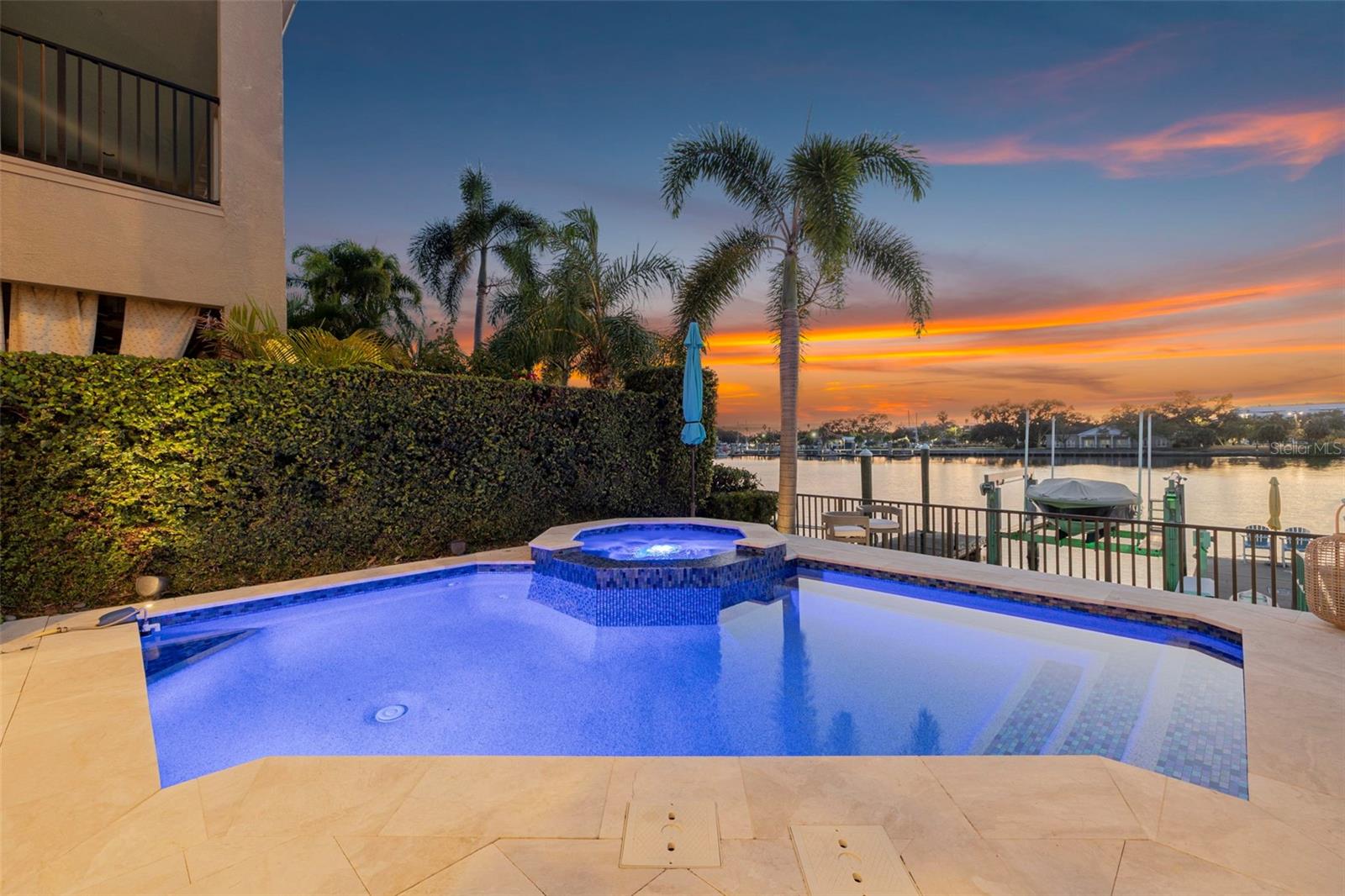 Sunset skies and shimmering water deliver an evening ambiance made for relaxation and gatherings.