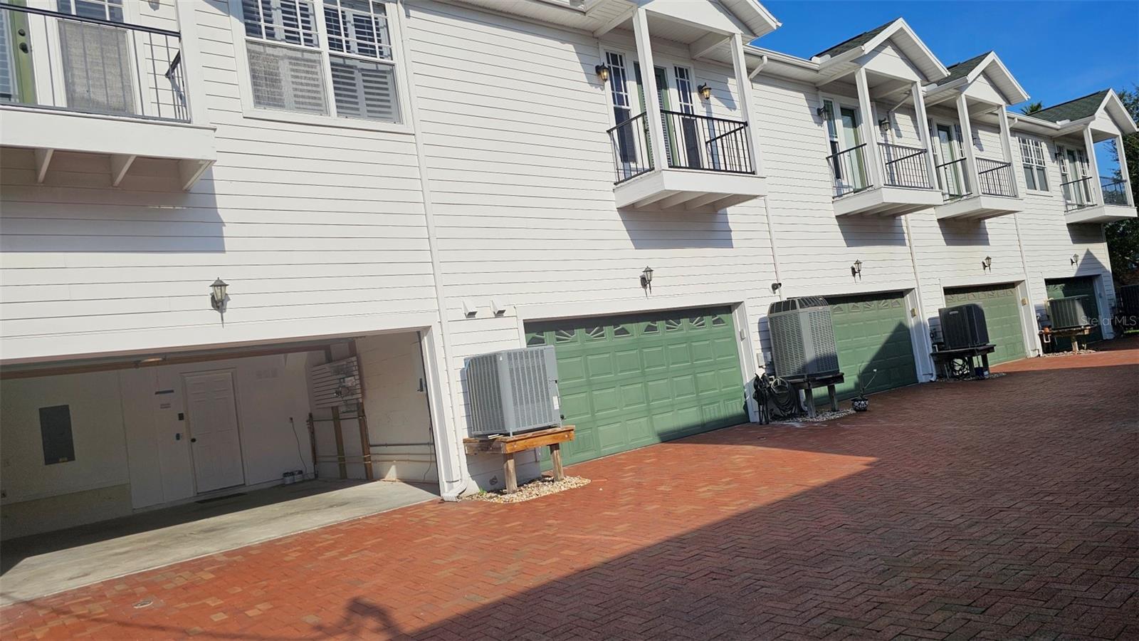 VIEW FROM COURTYARD/GARAGE