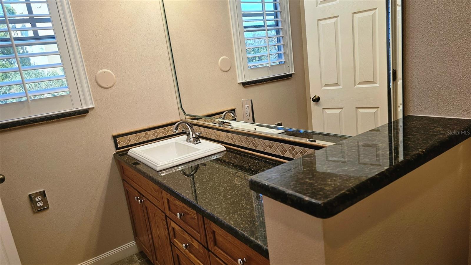 PRIMARY BATH WITH MARBLE COUNTERS