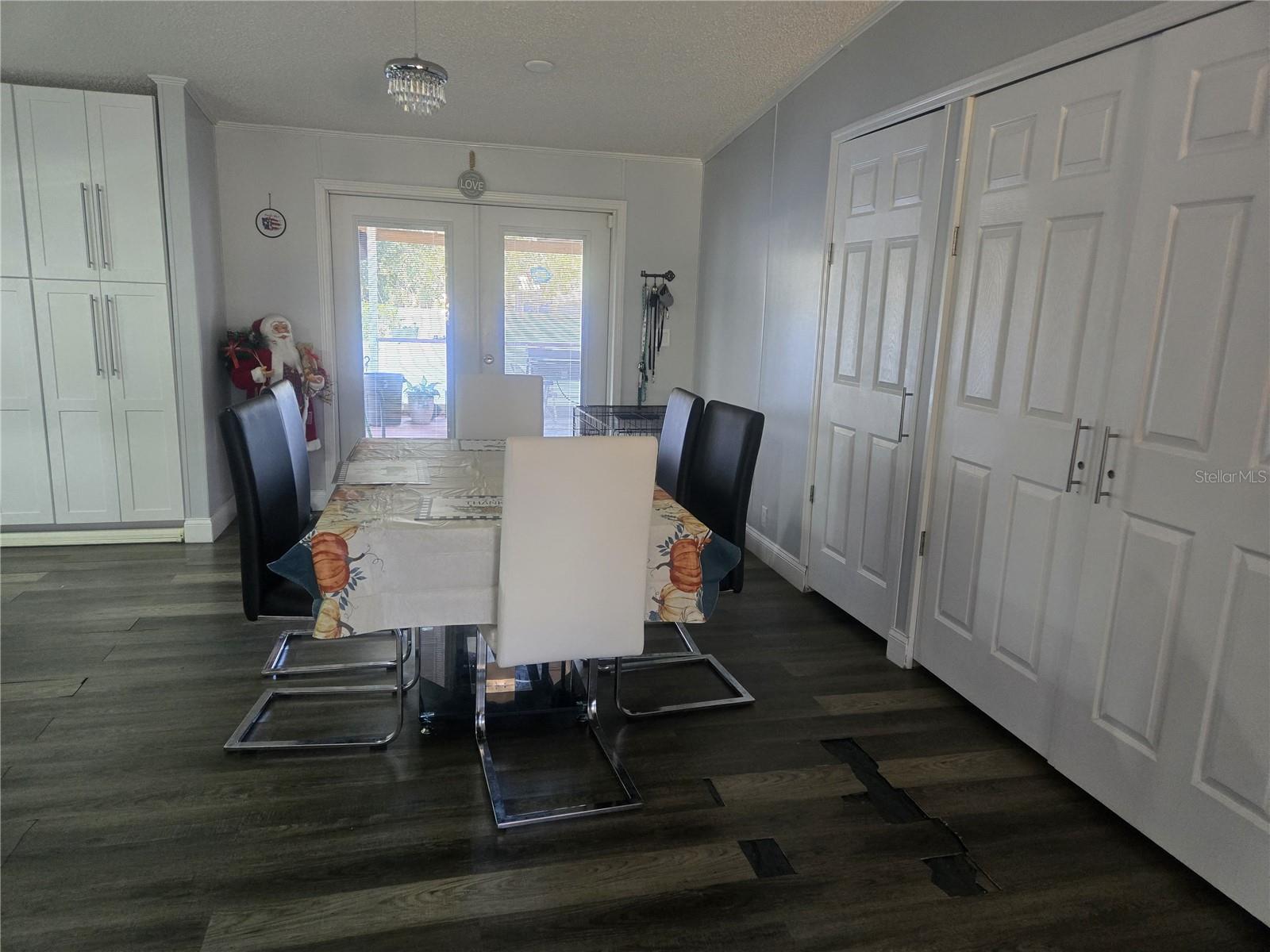Dining Room. French Doors towards Back Porch
