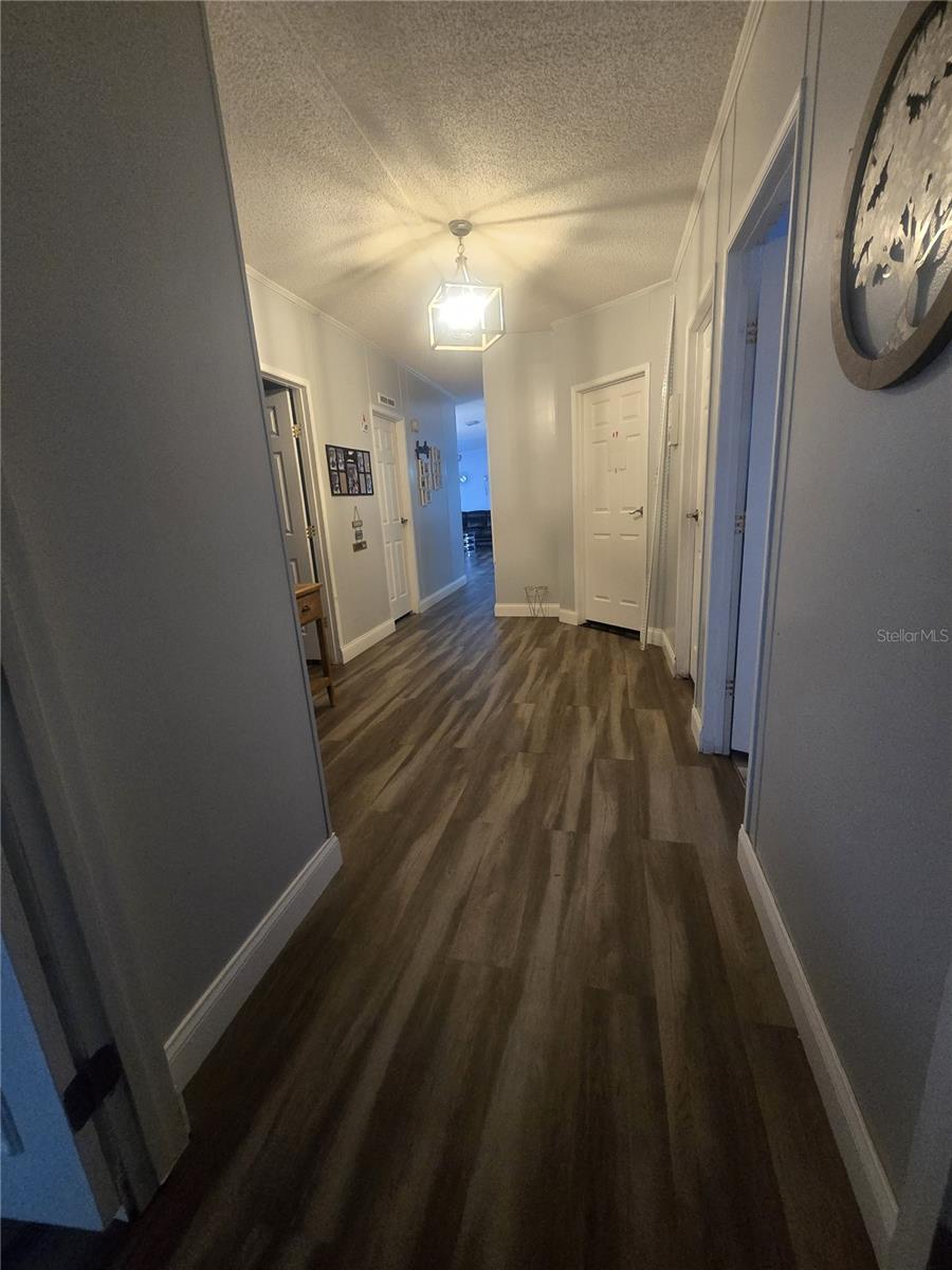 Hallway towards 4 bedrooms and Family room