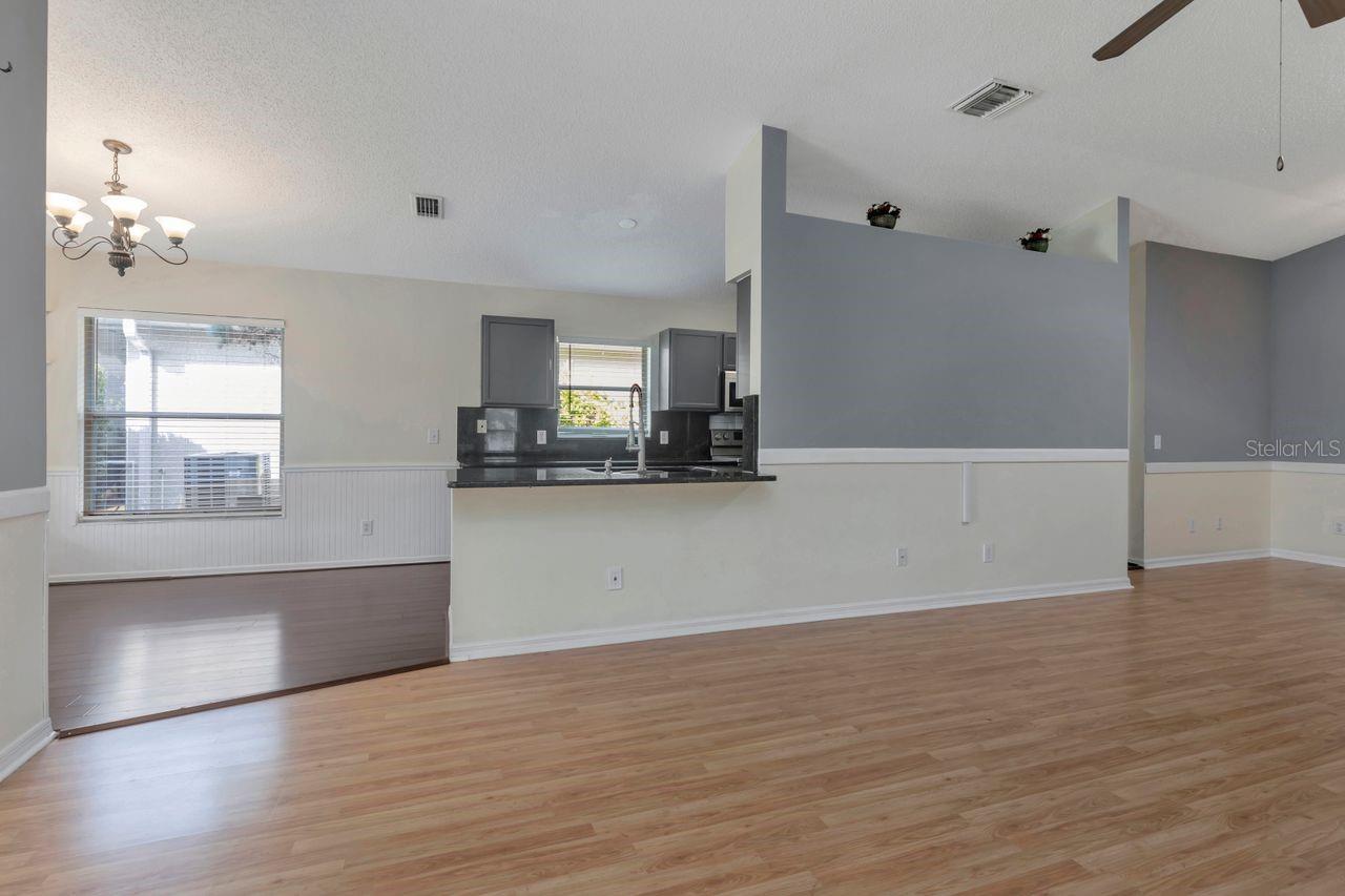 Breakfast bar with connecting to the living and dining room