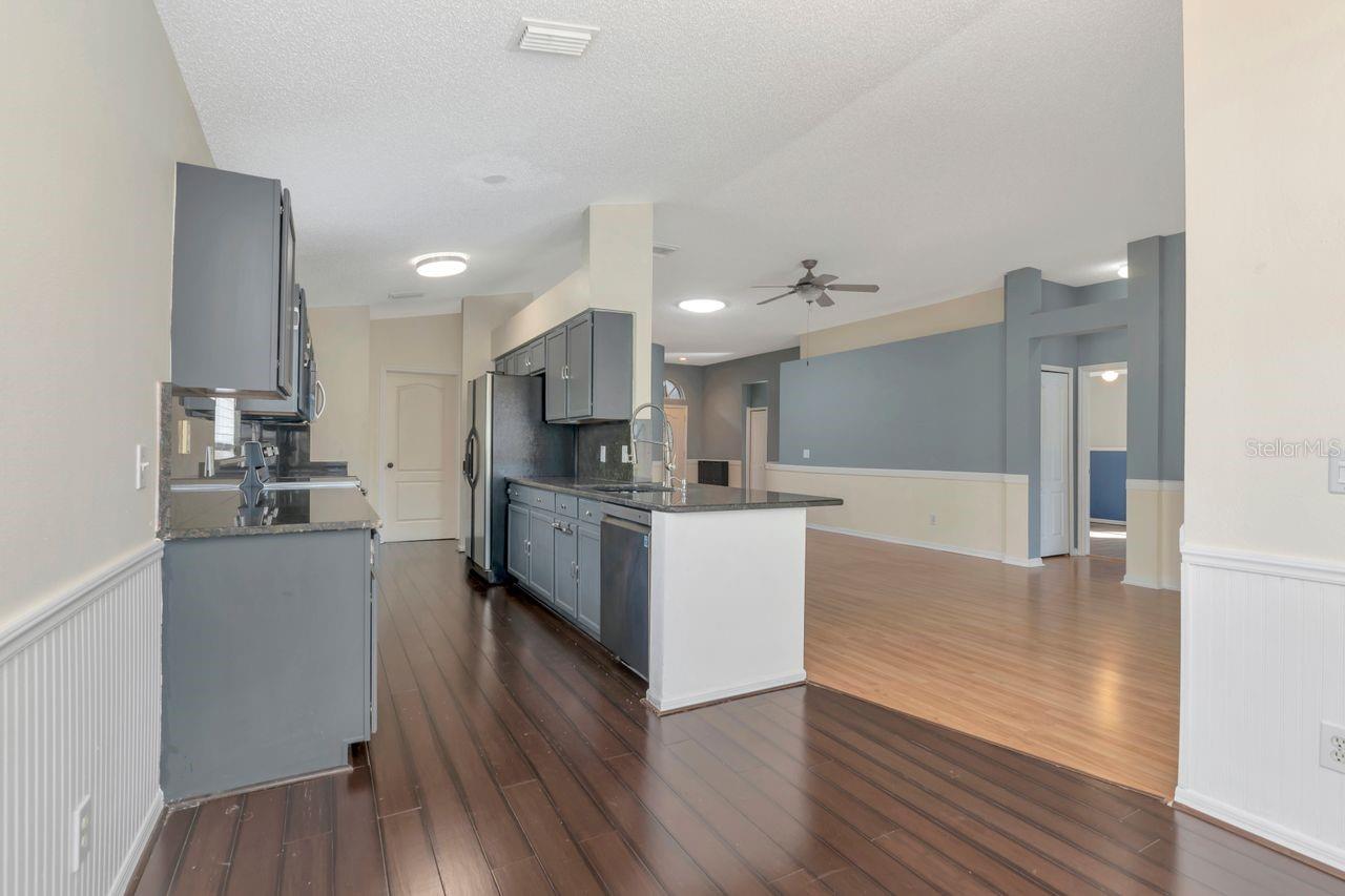 Kitchen with granite counters and stainless steel appliances