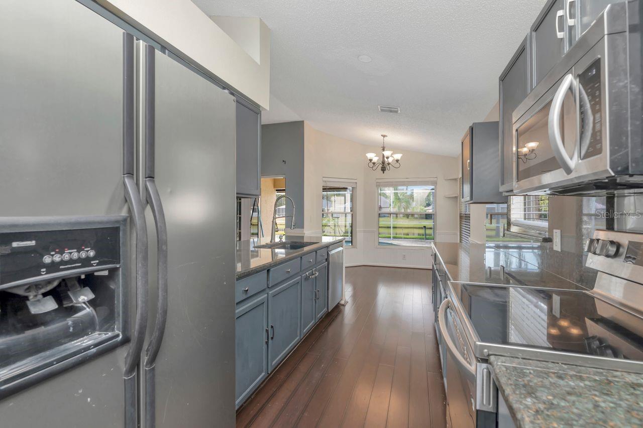 Kitchen with granite counters and stainless steel appliances