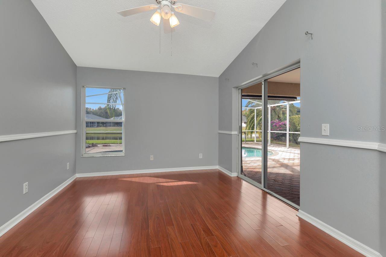 Primary bedroom with pool/lanai access