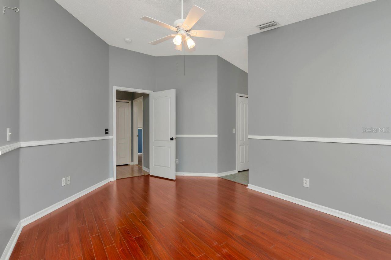 Primary bedroom with pool/lanai access