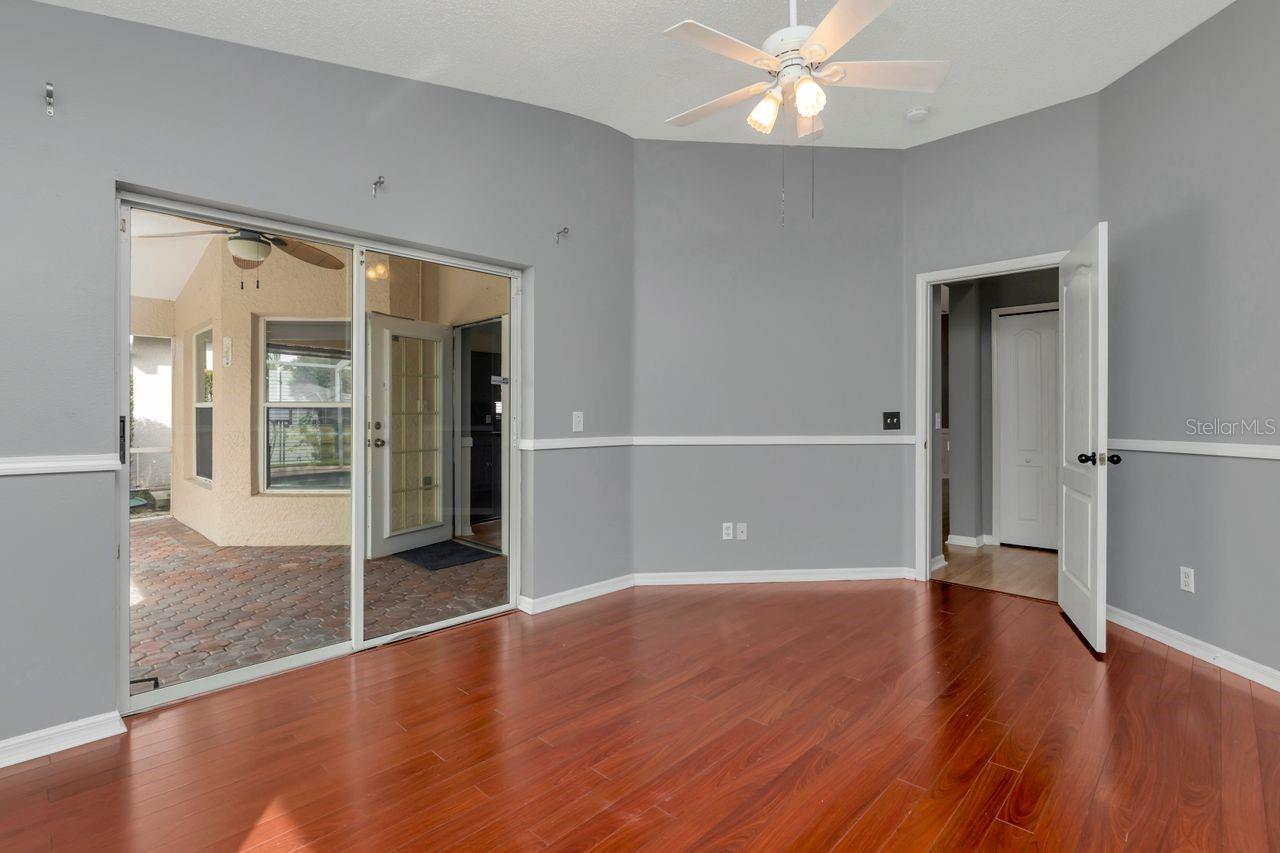 Primary bedroom with pool/lanai access