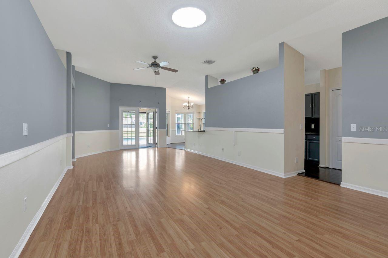 Large, Open Living space with high ceilings and lots of natural light