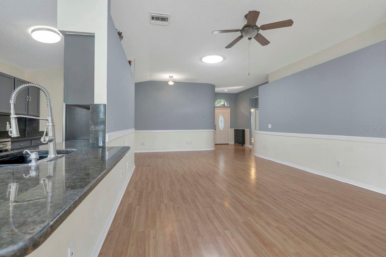 Breakfast bar with connecting to the living and dining room