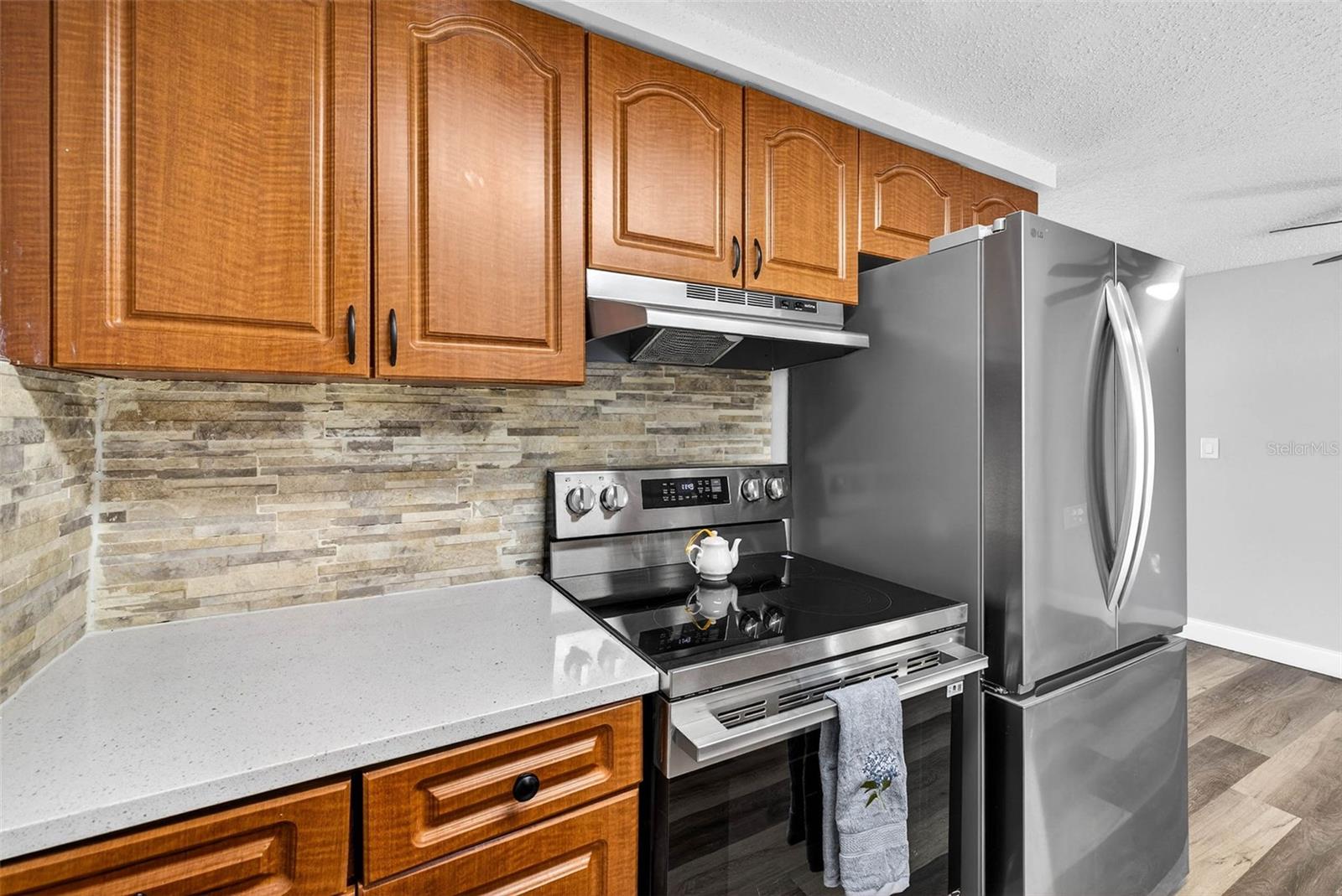 Wood Cabinets, Stone countertops, brand new appliances