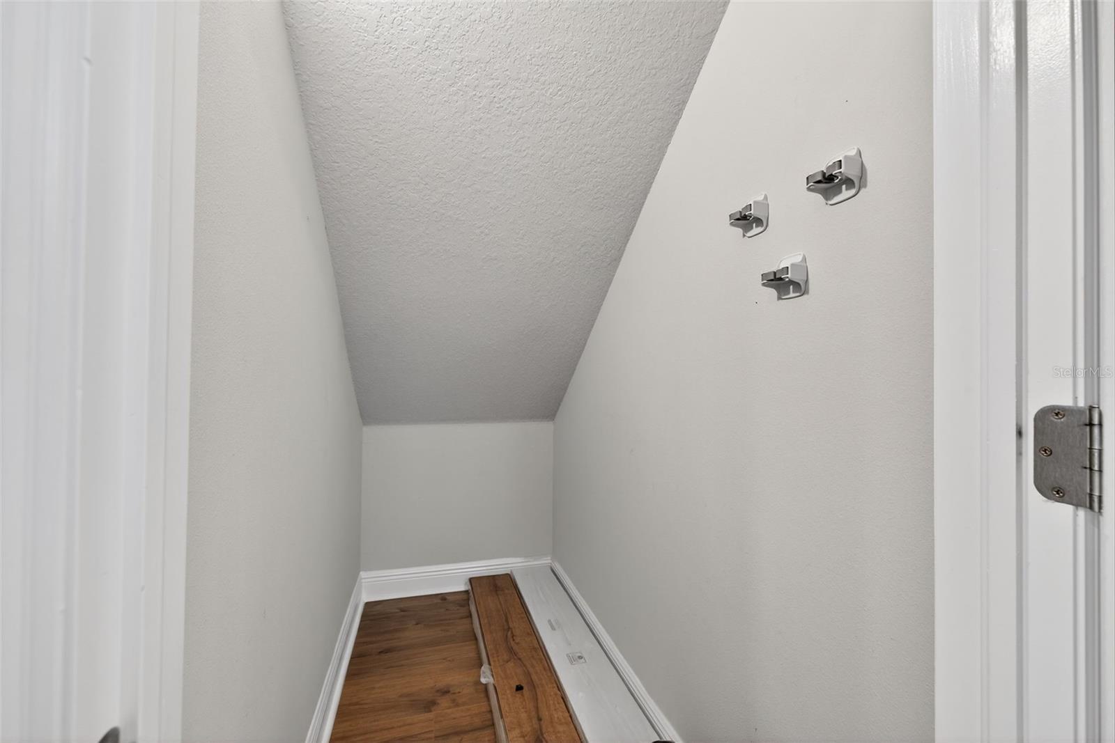 Large Storage Closet across from the Mudroom Shelving/Bench