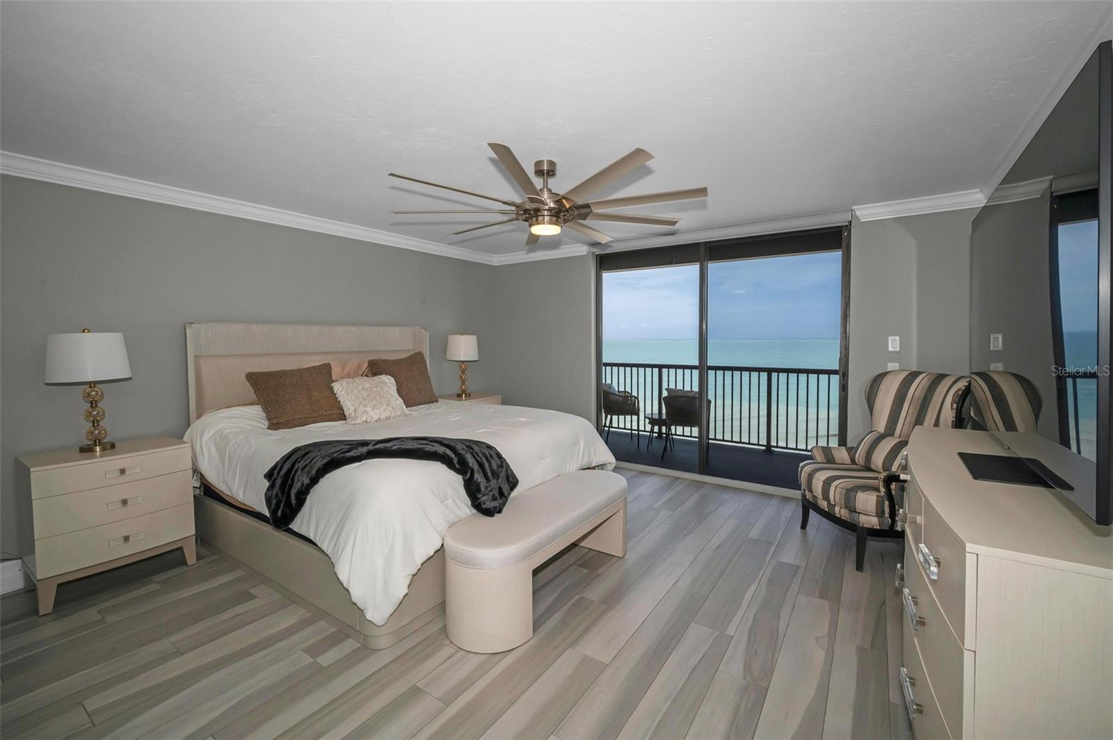 Gulf front Primary Bedroom with Sliding Glass Door to the Balcony