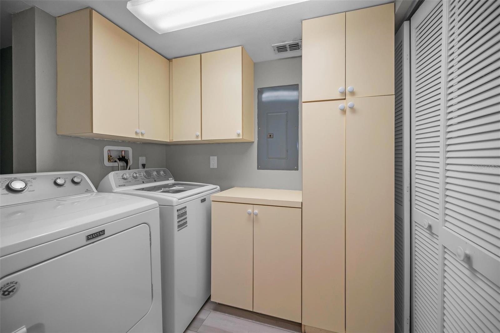 Inside Utility Room with Full sized Washer & Dryer