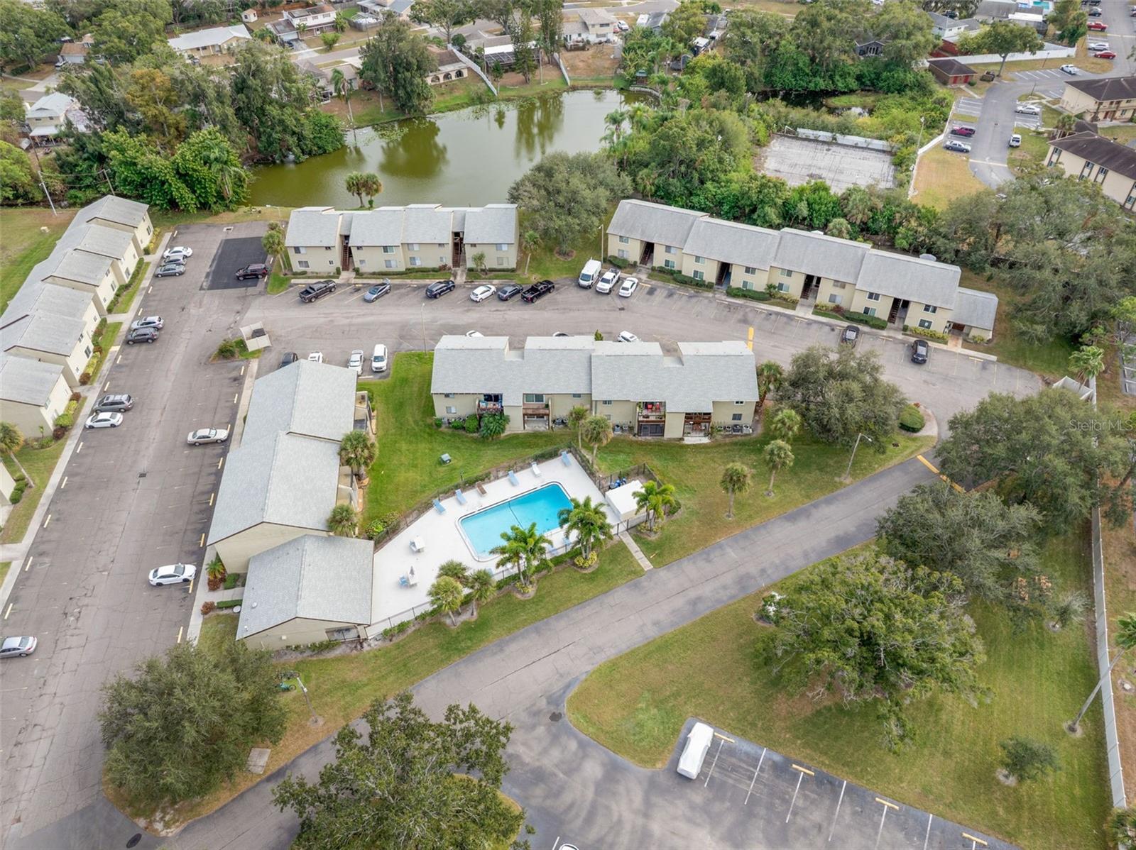 Pond view across in the distance between the buildings.