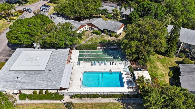 Pool & Shuffleboard behind Clubhouse & Onsite Management Office.  Laundry facilities are also located near each pool.