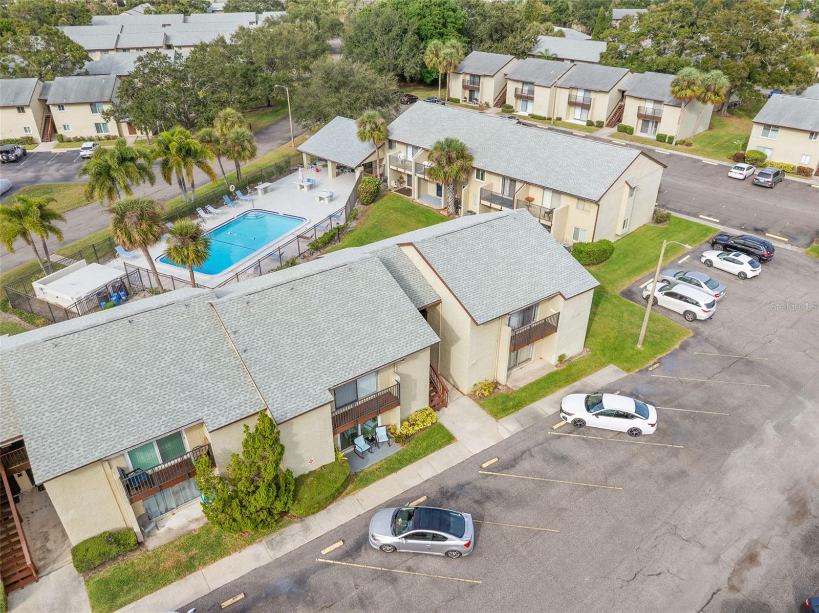 Pool conveniently located behind this building.