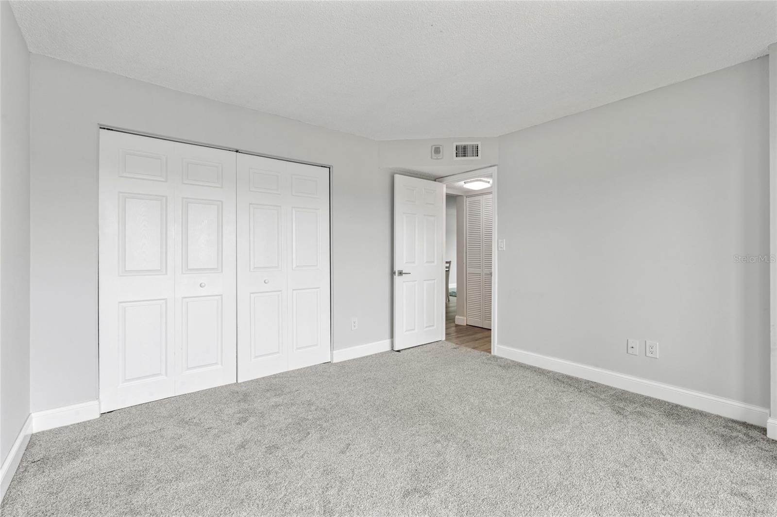 Secondary Bedroom with private balcony