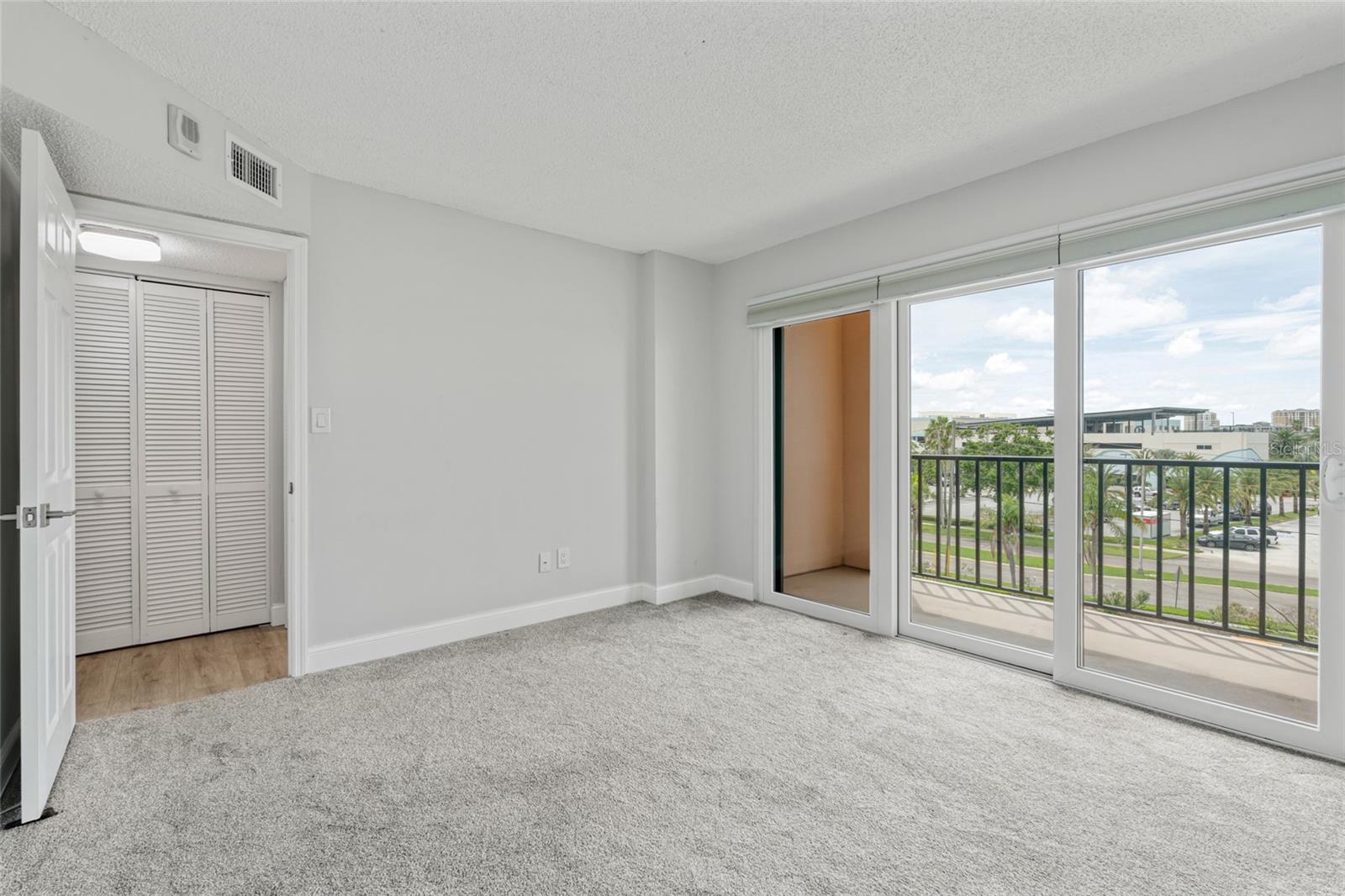 Secondary Bedroom with private balcony