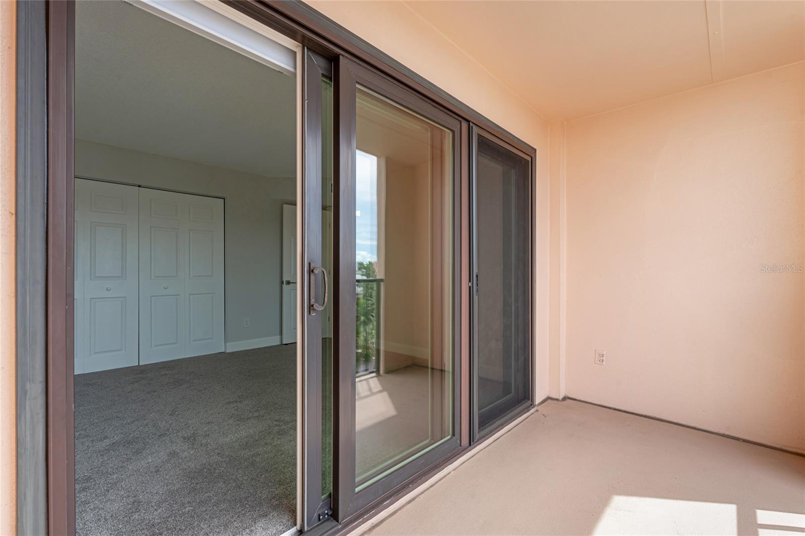 Secondary Bedroom with private balcony