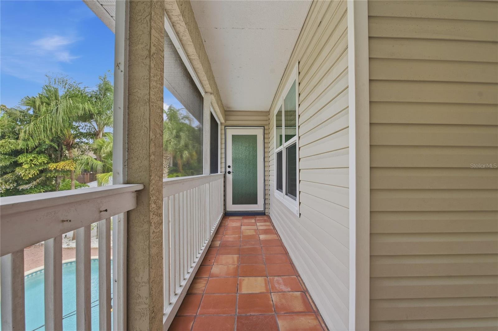 ACCESS FROM THE PRIMARY SUITE TO YOUR COVERED AND SCREENED IN PATIO