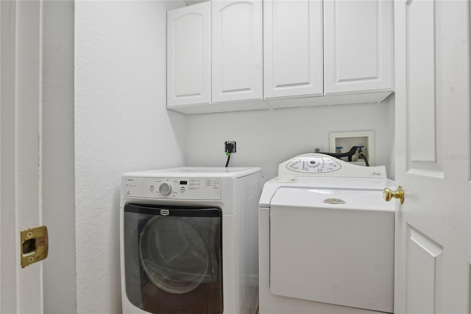 INSIDE LAUNDRY ROOM, CONVENIENTLY LOCATED NEAR ALL THE BEDROOMS!