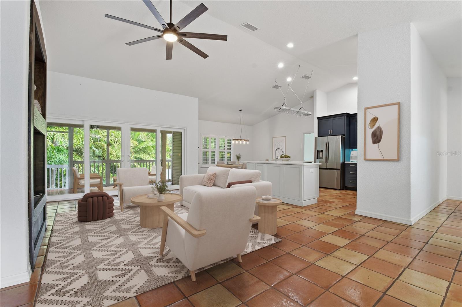 VAULTED CEILINGS AND SPANISH TILE THROUGHOUT THE MAIN LIVING AREAS