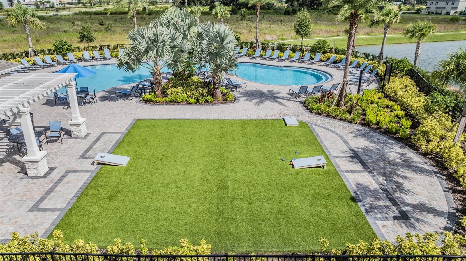 sports area/open field next to the pool