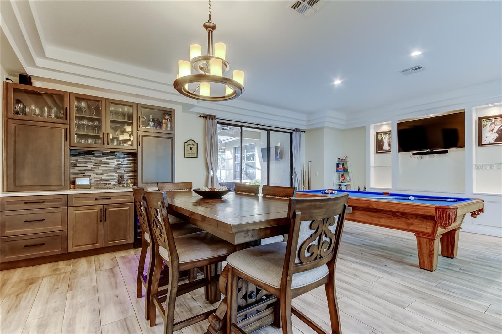 Ideal for large dinner parties or a game of pool. This is an open Living/Dining Room